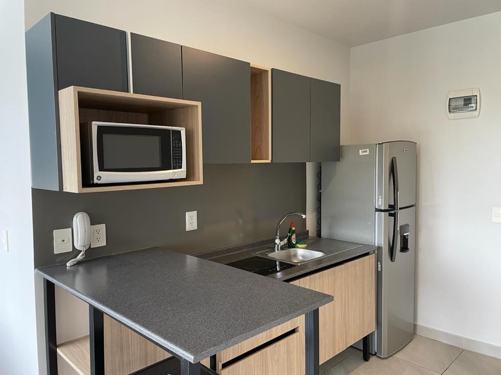Livup Suites En Zona Iteso Сапопан Экстерьер фото
