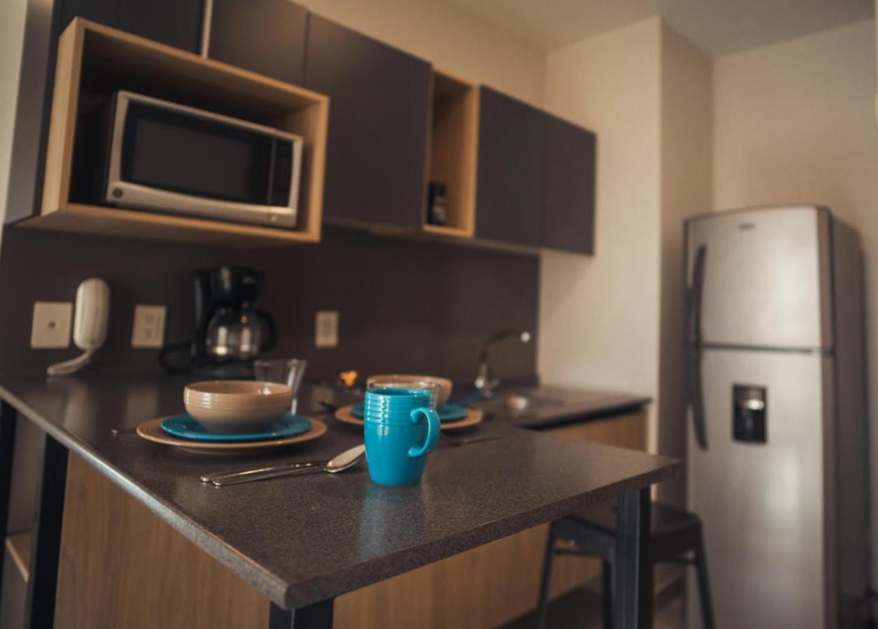 Livup Suites En Zona Iteso Сапопан Экстерьер фото